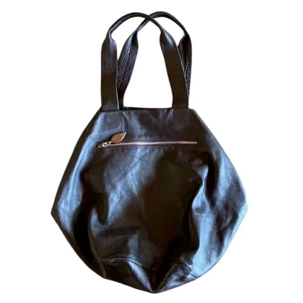 Neta Sade black leather‎ hobo purse.